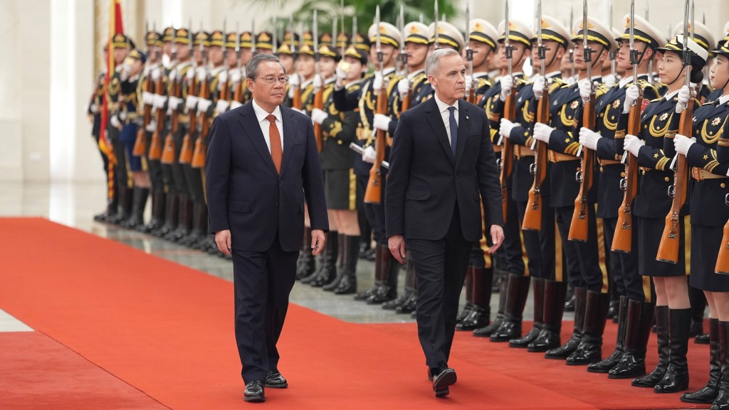 李強在人民大會堂北大廳為卡尼舉行歡迎儀式。中新社