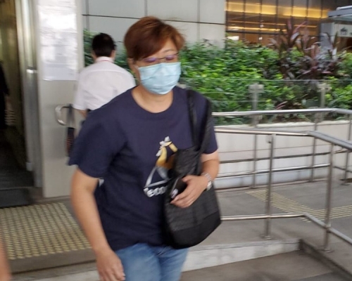 證人沈麗華。王尚哲攝