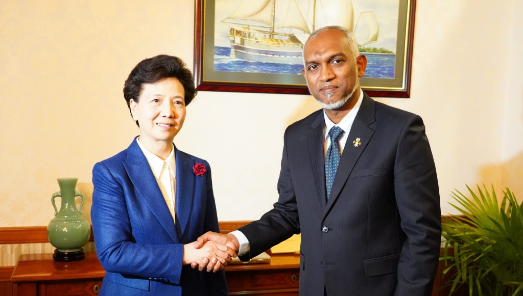 穆伊茲與國務委員諶貽琴會面。