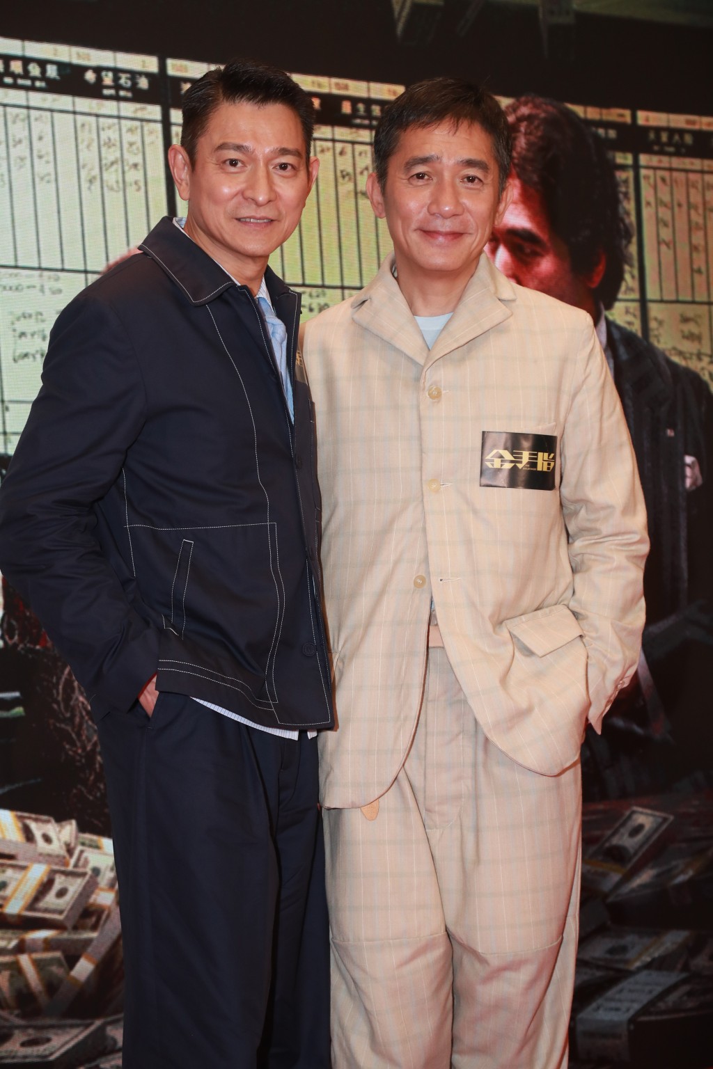 兩大影帝劉德華與梁朝偉相隔廿年再度合作的英皇電影《金手指》，將於12月30日全球同步開畫 。