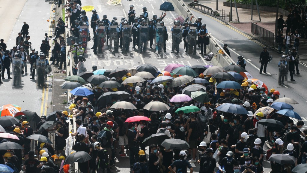 5年前的7月1日，金钟多处发生连场警民冲突，多人被捕。资料图片