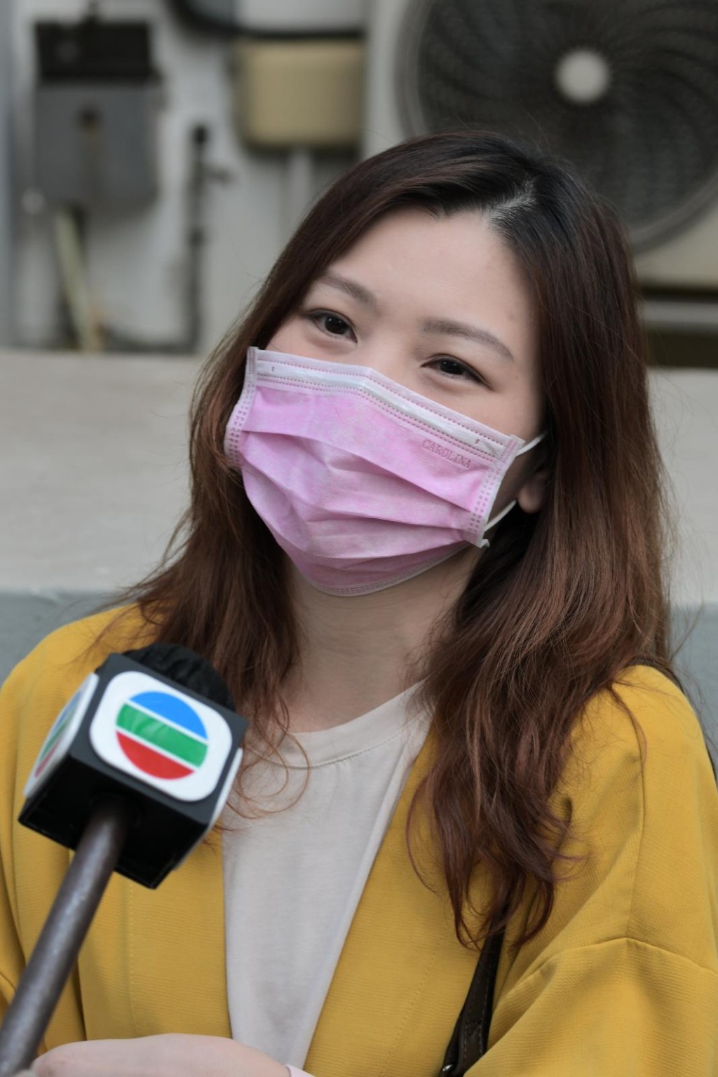 郭小姐今早七時許已在喇沙小學校門外排隊,她指喜歡喇沙校風及校舍設備優良。