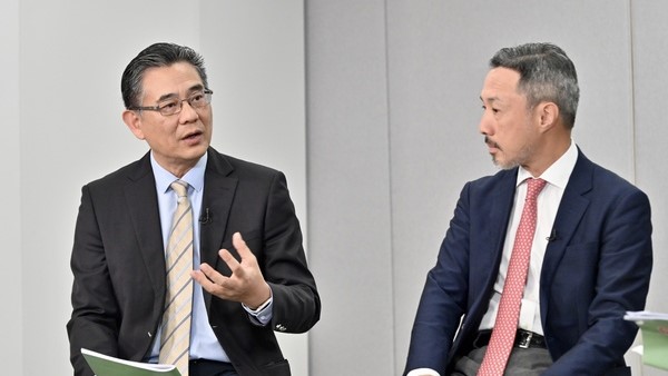 楊德斌(左)表示,香港要融入國家發展大局,必須打通與內地的人流、物流、資金流和信息流。政府新聞處