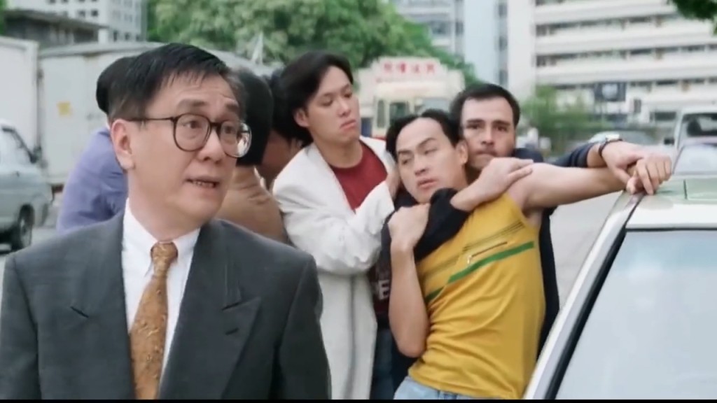陳志輝在《新英雄本色》與黃霑有對手戲。