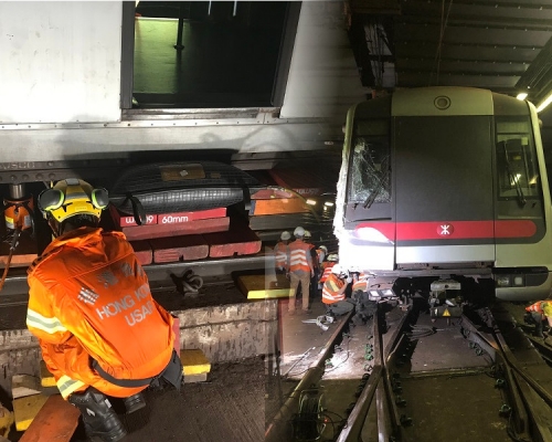 在消防協助下,港鐵晚上終於將車廂起落架放回路軌。