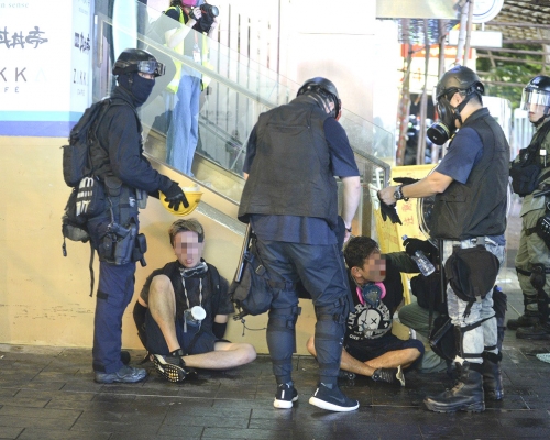 警员拘捕大批示威者。资料图片
