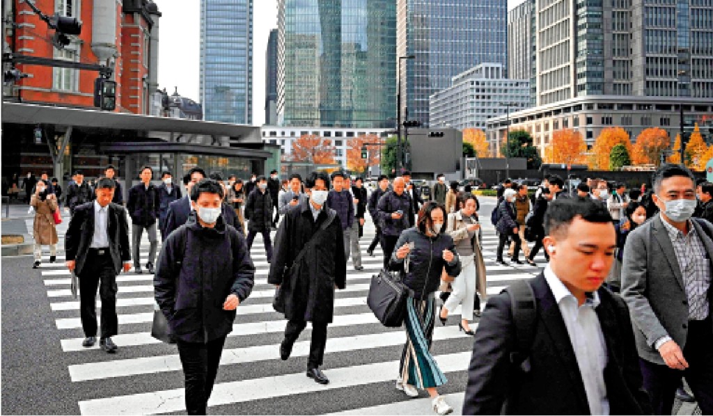 日本4月起收紧外国人入籍条件。法新社