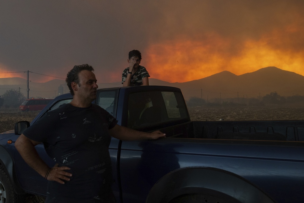 希腊山火至今仍未救熄。美联社