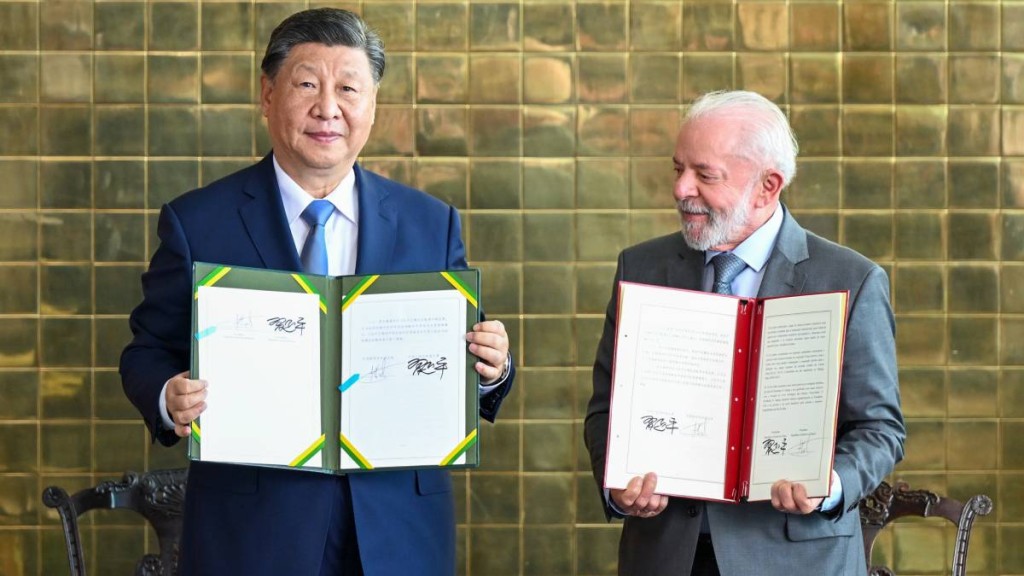 習近平去年在巴西利亞同盧拉會面。新華社 習近平去年在巴西利亞同盧拉會面。新華社