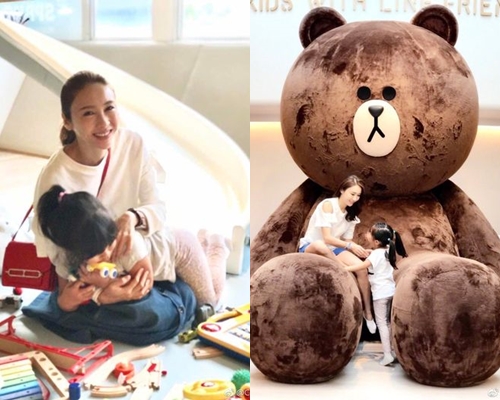 黎姿一向貼出囡囡背面照。