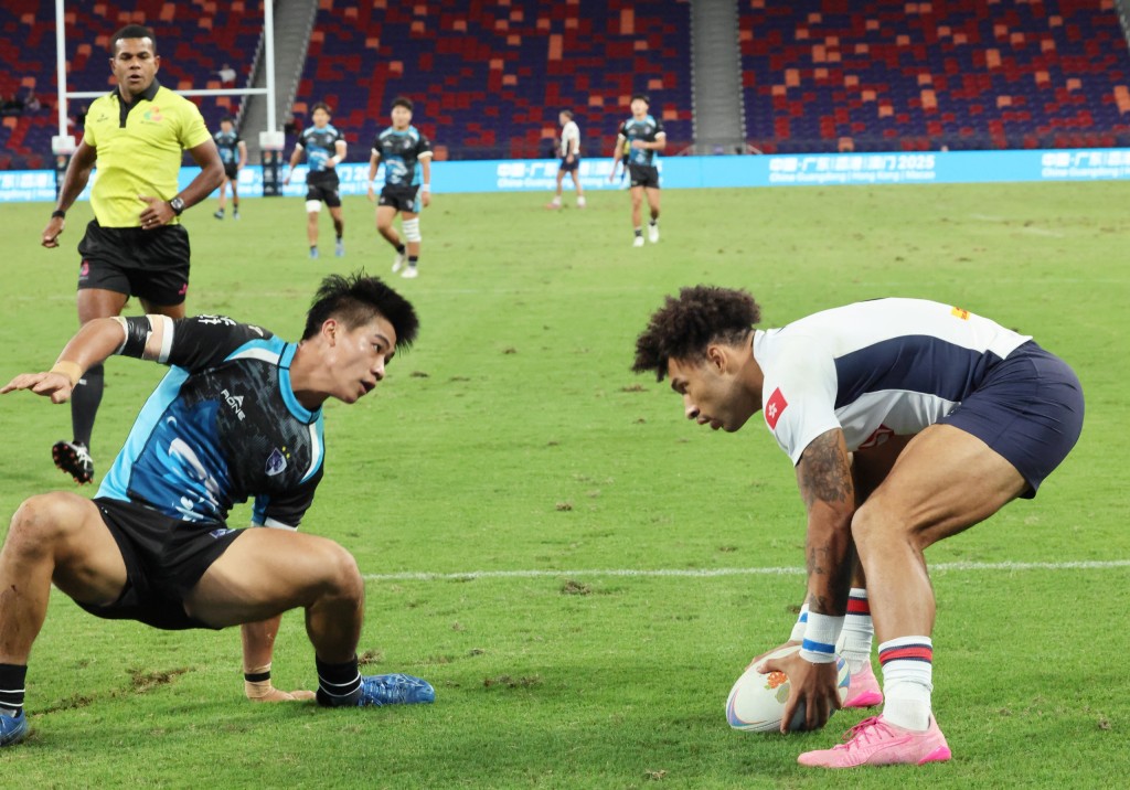 丹马克（右）达阵一刻。徐嘉华摄