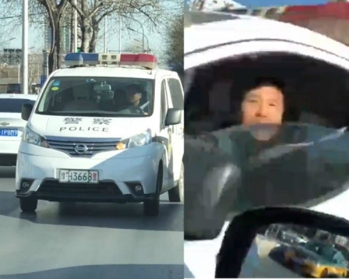 北京有警車逆行，民警反鬧拍攝網民 。網上圖片