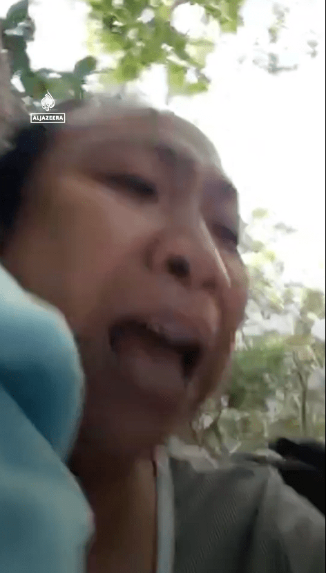 菲傭 Nerissa Catabay抱着幼主由23樓狂奔逃命，更邊走邊直播，提醒同鄉及住戶盡快離開。X@Al Jazeera English