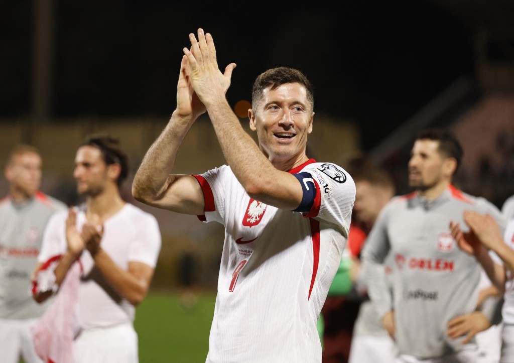 波兰获得G组次名，转战附加赛。路透社