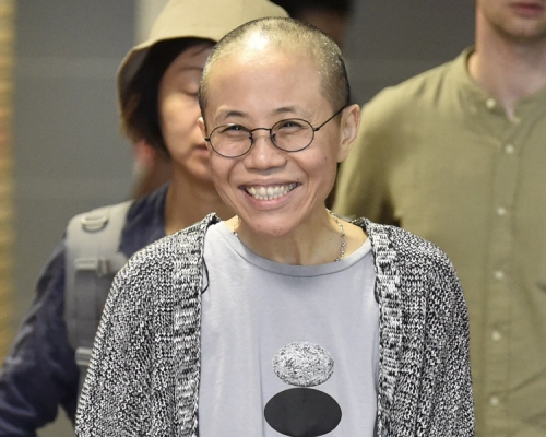 德國政府指劉霞可以長期居留。AP