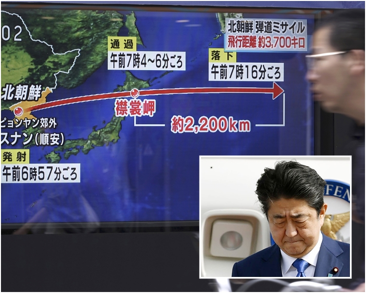 今次是北韓導彈第6度飛越日本上空,安倍(小圖)作出強烈譴責。AP