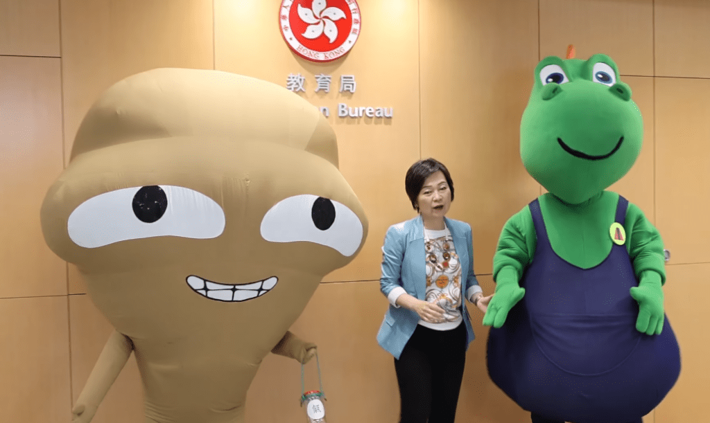 教育局局長蔡若蓮在社交專頁發布影片，邀請「大嘥鬼」及「清潔龍阿德」拍攝短片，為考生們打氣。蔡若蓮Facebook