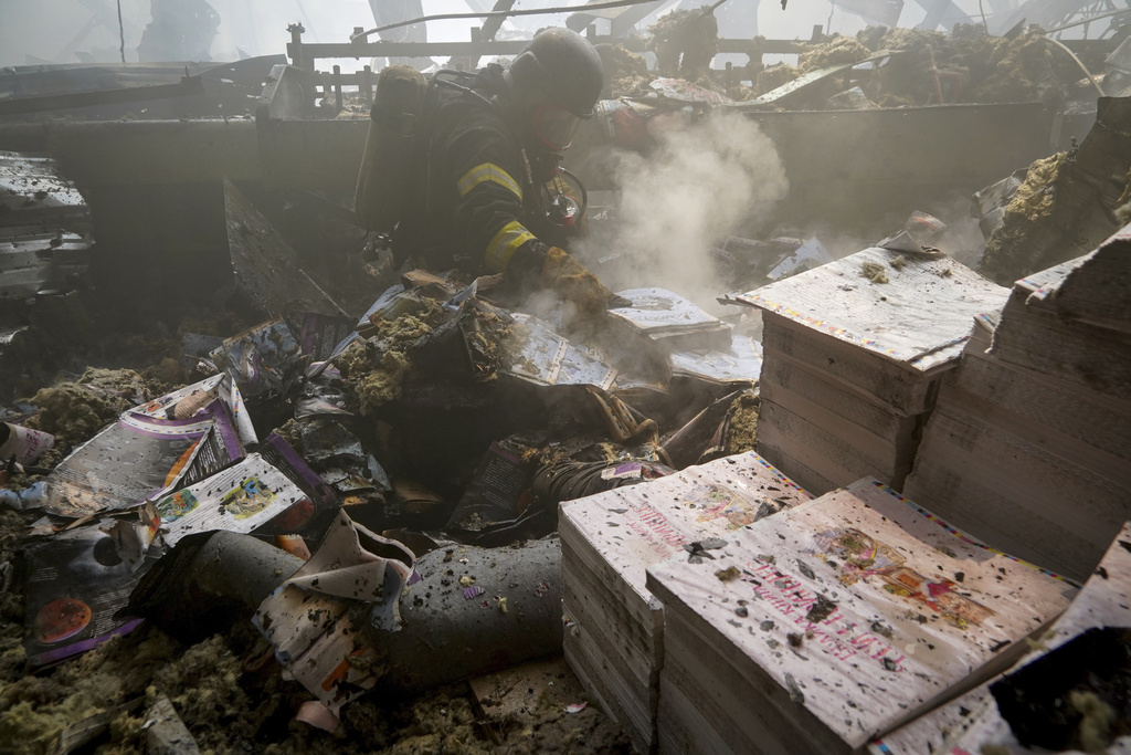 乌克兰哈尔科夫一间印刷厂遭受袭击。美联社