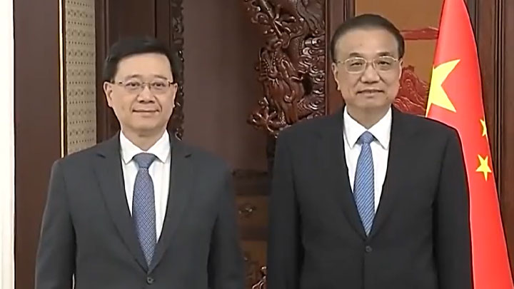李克強指將推動香港與內地人員往來逐步回復正常。央視截圖