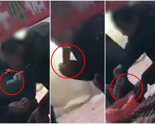 糖葫蘆小販用口水沾芝麻被拍下。(網圖)