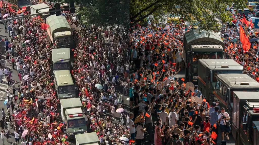 市民夾道歡送消防員車隊,場面誇張。