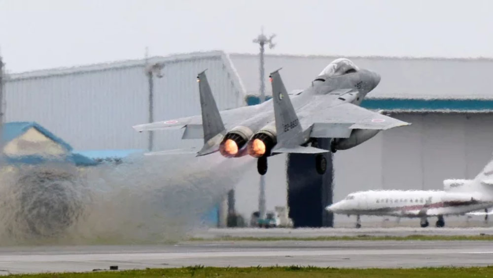日本F-15戰機失事兩周後,尋獲第兩名機師遺體。路透社圖片