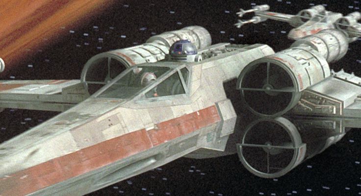 電影《星球大戰》中的Xwing戰機後座安放R2D2機器人。 電影《星球大戰》中的Xwing戰機後座安放R2D2機器人。