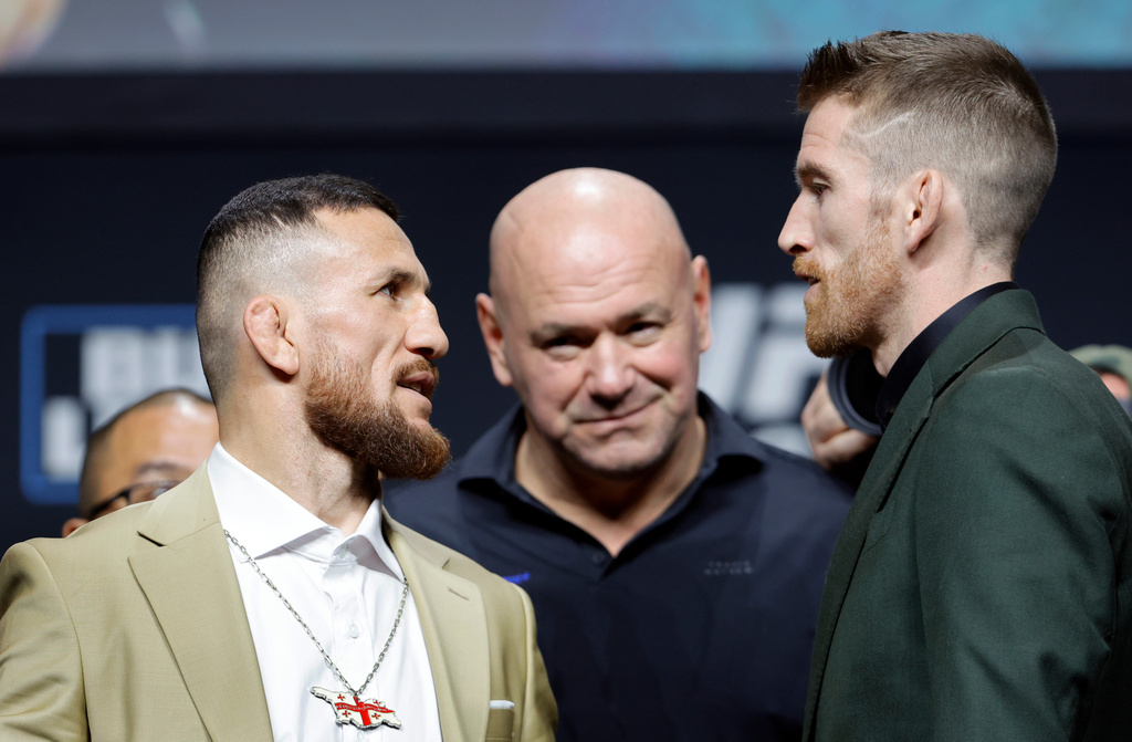 中間男子為UFC執行長、特朗普的朋友和捐助者懷特（Dana White）。美聯社