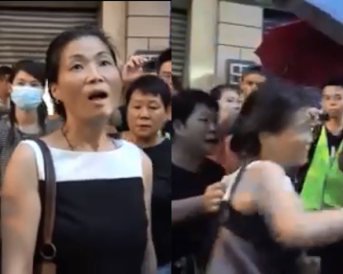 清除路障為車開路，旺角女子與示威者口角繼而被追打。CBC截圖