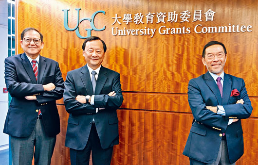 ■唐家成(右)宣布,增撥二億五千萬元鼓勵進行有關新冠病毒等研究。