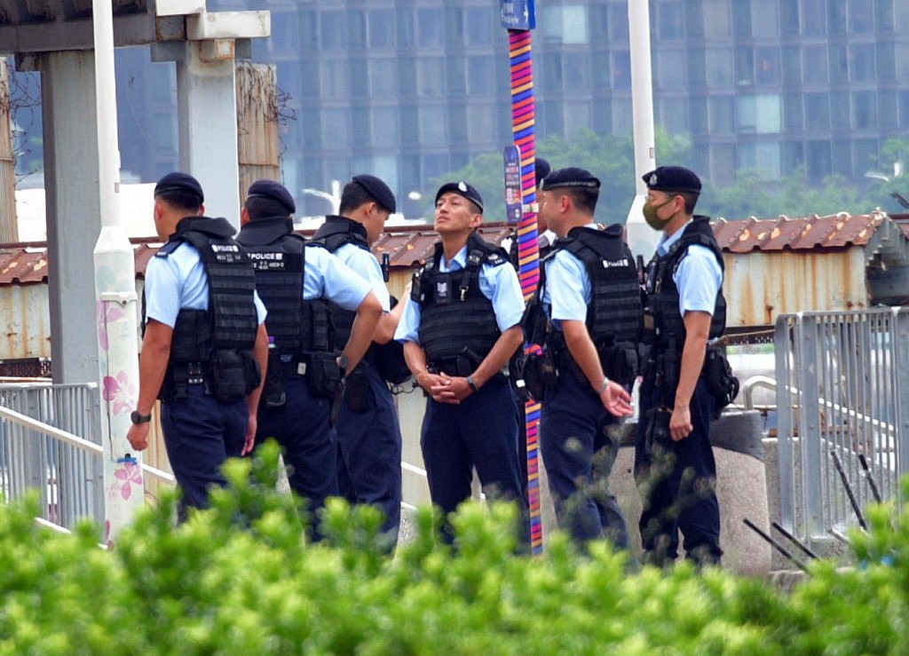 政府明日早上将在金紫荆广场举行升旗传式，警方将会派驻警力驻防。资料图片