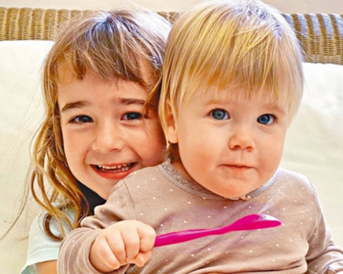 6歲女童奧利維亞與1歲的妹妹安娜。