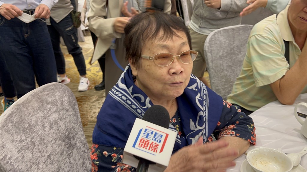 谭女士指领导人关心香港发展，自己作为市民感觉很开心。郭咏欣摄