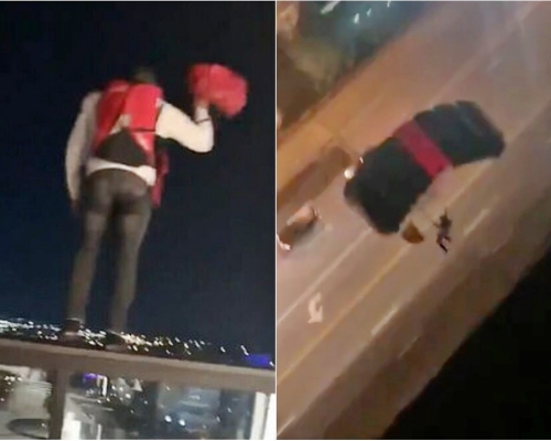 美國兩名男子於酒店天台跳傘。網圖