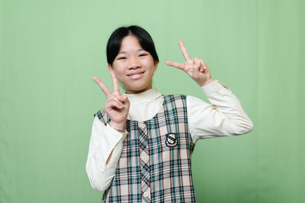 大角嘴天主教小學小六生鄧曦雯：留意時事題鄧曦雯（圖：李沃濤）