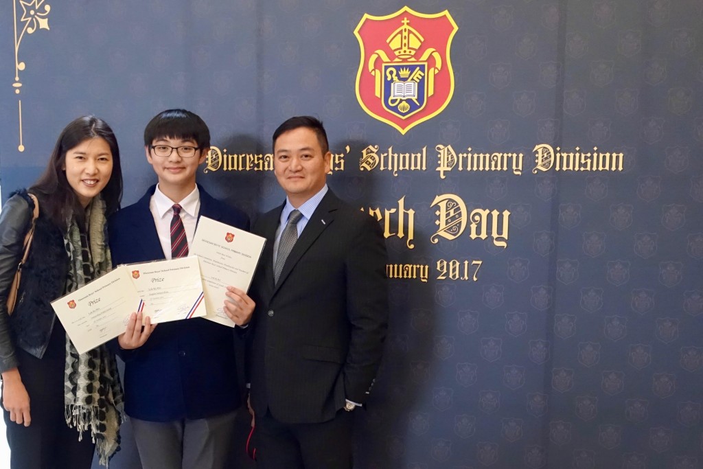 駱家熙（中）對音樂充滿熱誠，歸功於父母的支持和鼓勵。