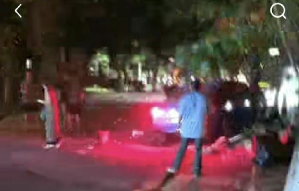肇事汽車疑衝上行人路。