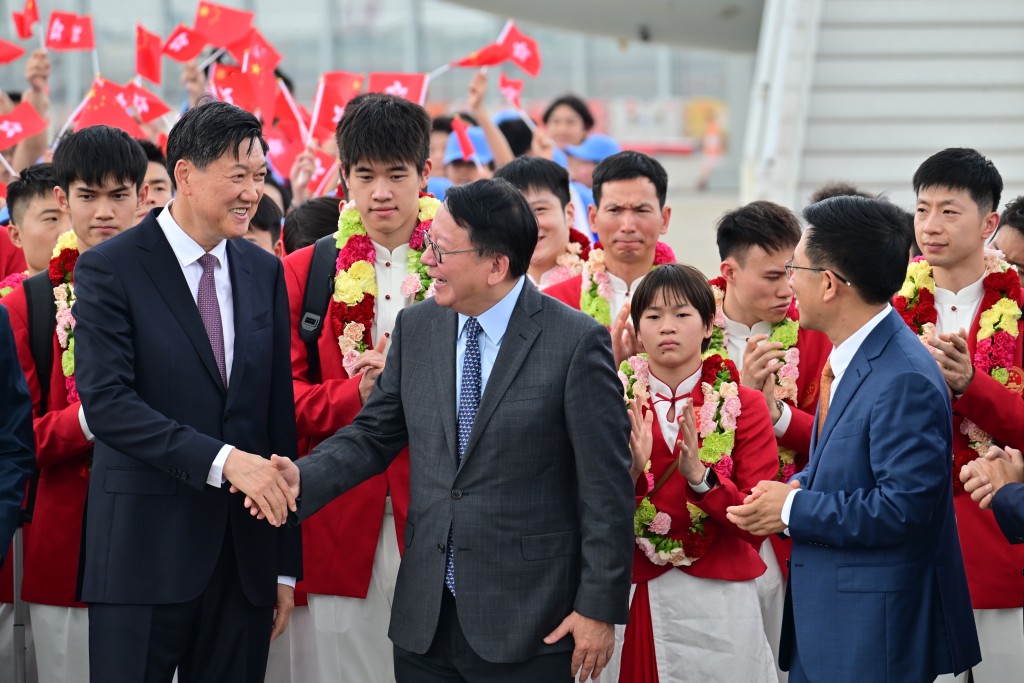 陳國基與國家體育總局局長高志丹握手。陳極彰攝