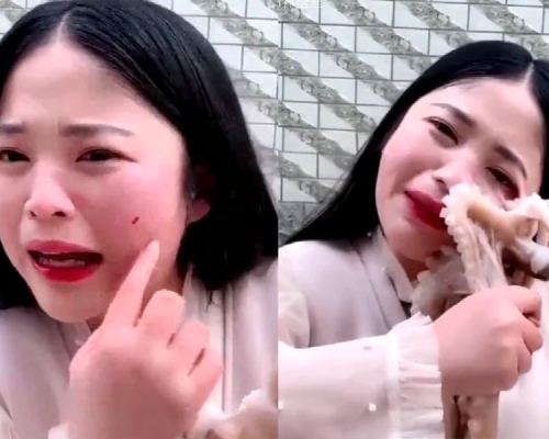 女主播生吃活章魚過程中,臉部受損出血了。(網圖)