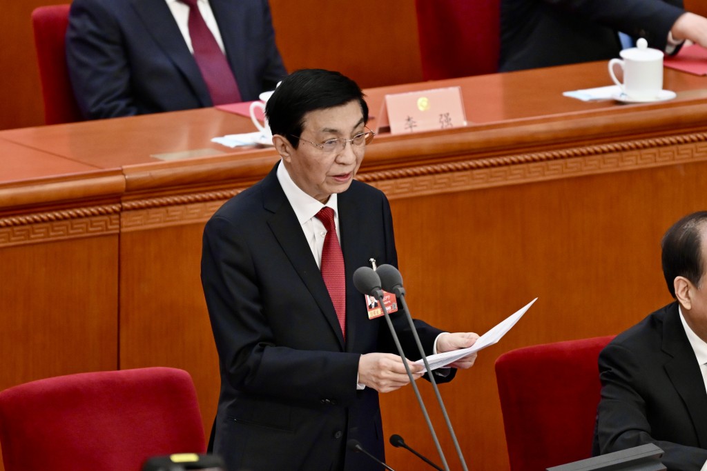 中共中央政治局常委、全國政協主席王滬寧發表講話。