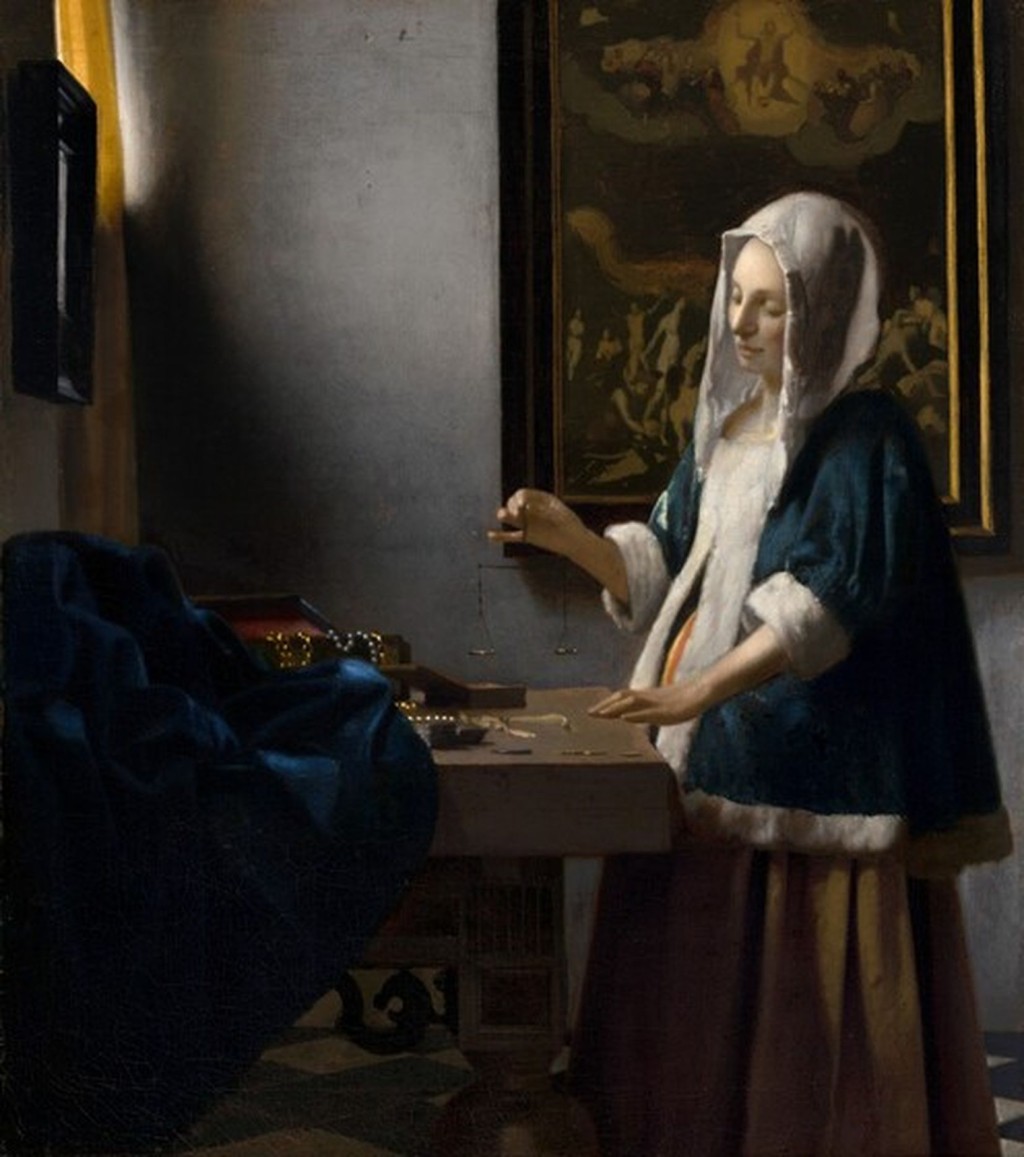 維梅爾畫作《持秤的女子》。