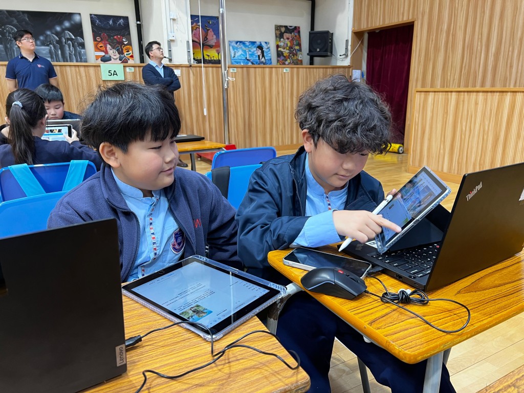 同學們明白AI只是輔助工具,過程中需要不斷發揮團隊合作精神,反覆微調指令以求盡善盡美。(圖片來源:受訪學校提供) 同學們明白AI只是輔助工具,過程中需要不斷發揮團隊合作精神,反覆微調指令以求盡善盡美。(圖片來源:受訪學校提供)