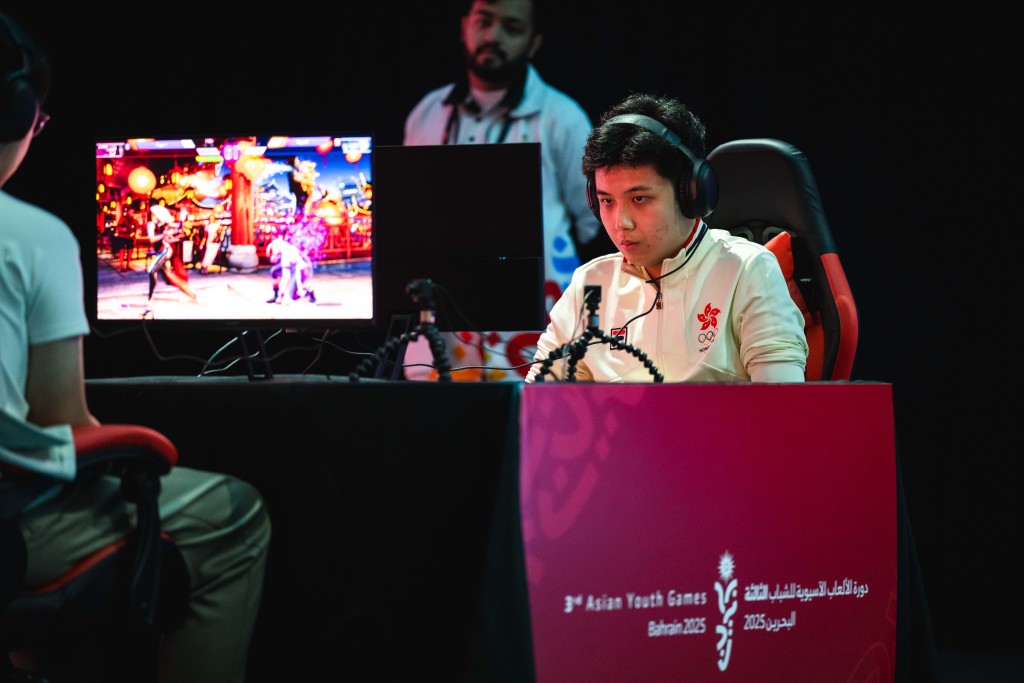 電競運動員陳栢賢在「街頭霸王6」決賽勇奪冠軍。港協暨奧委會圖片 電競運動員陳栢賢在「街頭霸王6」決賽勇奪冠軍。港協暨奧委會圖片