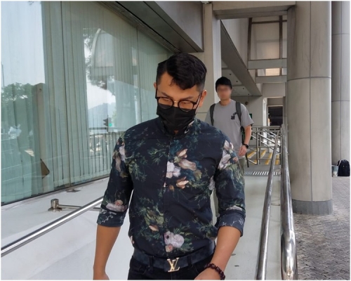 被告黃琪昌(戴口罩者)。呂綺雯攝