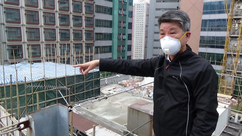 旁邊大廈管理處陳先生