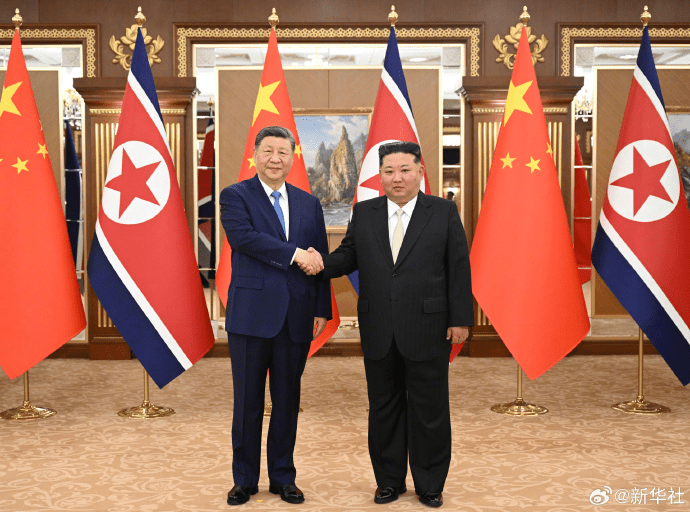習近平訪朝與金正恩會談。 新華社 習近平訪朝與金正恩會談。 新華社