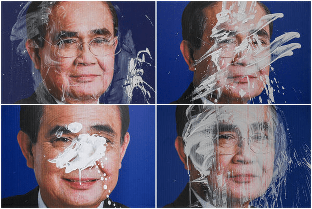 張貼在曼谷的泰國總理巴育競選海報，於4月14日潑水節期間遭人以顏料塗抹。路透