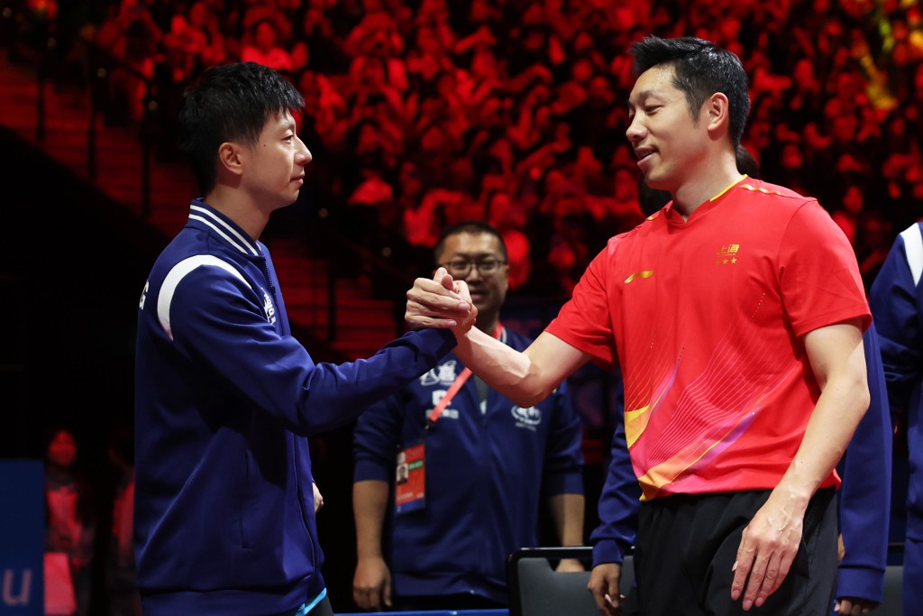 中國男乒隊請來馬龍(左)和許昕(右)兩位名宿幫助訓練。新華社