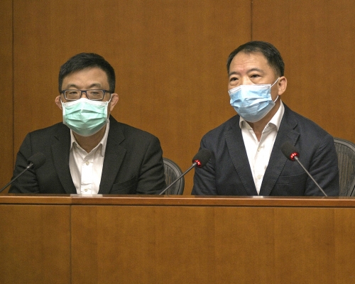 涂謹申、胡志偉。資料圖片