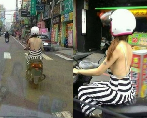 該名長髮騎士不畏冬天低溫穿著開大洞的露背裝騎車。